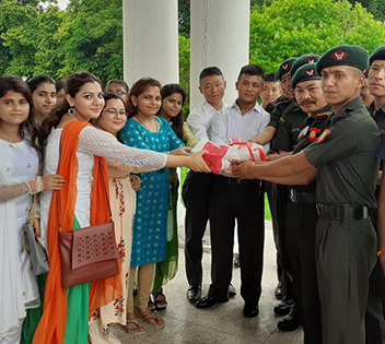 Raj Bhavan's children tie rakhi to soldiers at army headquarters