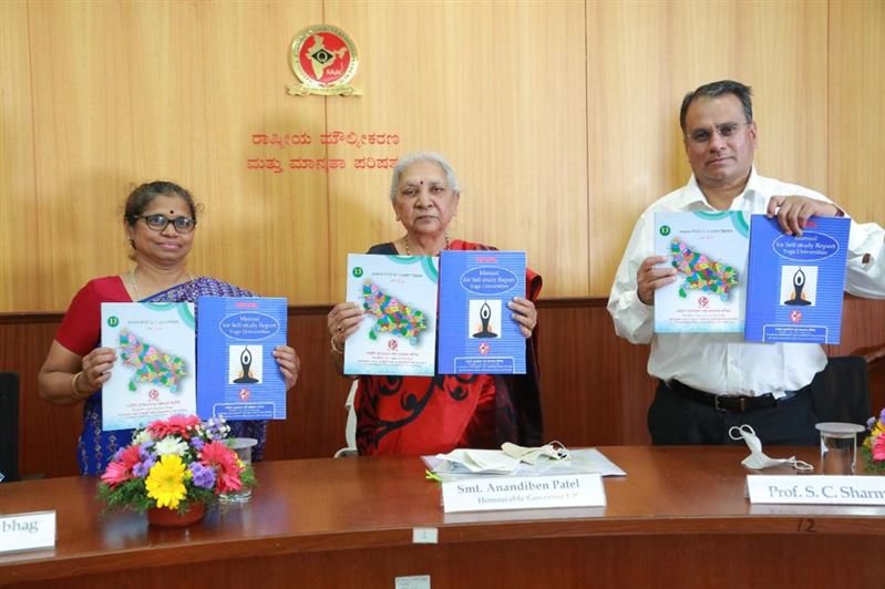 The Governor releases &apos;Manual for Yoga Institutions and State-wise Analysis of Institutions of Higher Education in Uttar Pradesh&apos;./राज्यपाल ने ‘योग संस्थानों के लिए नियमावली और उत्तर प्रदेश में उच्च शिक्षा संस्थानों की राज्यवार विश्लेषण’ का विमोचन किया